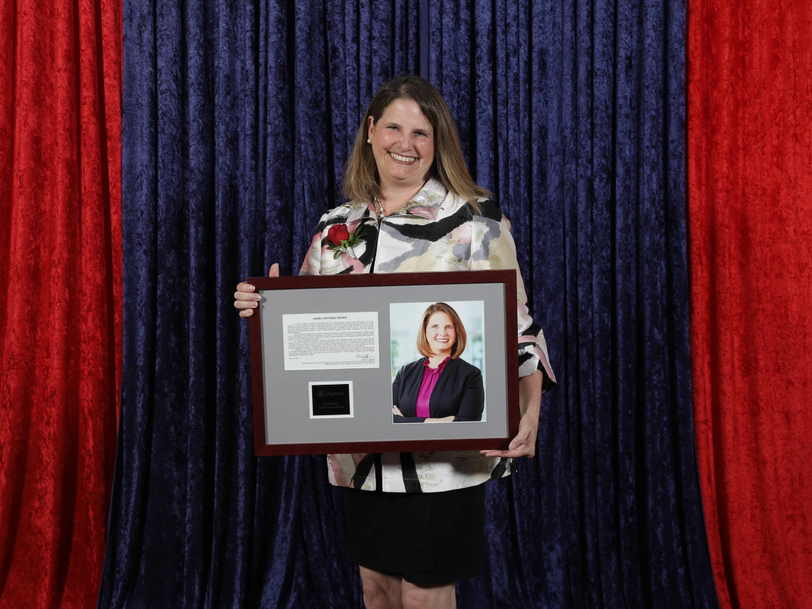 Tepper with award (4).jpg