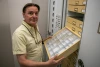 Gene Hall posing in front of the UArizona Insect Collection 